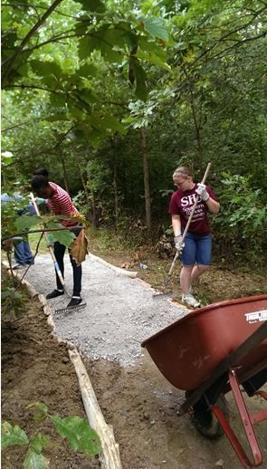 Volunteers help with Green Earth, Inc.'s preservel work
